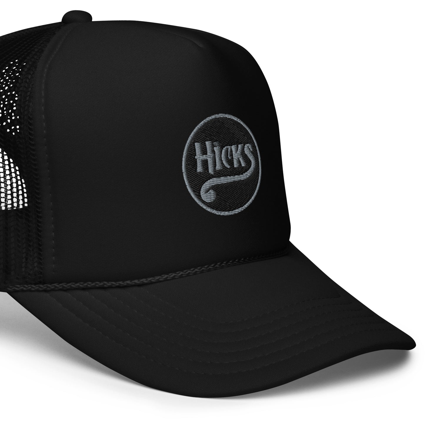 
                  
                    The Hicks Black/Grey Foam Trucker Hat
                  
                